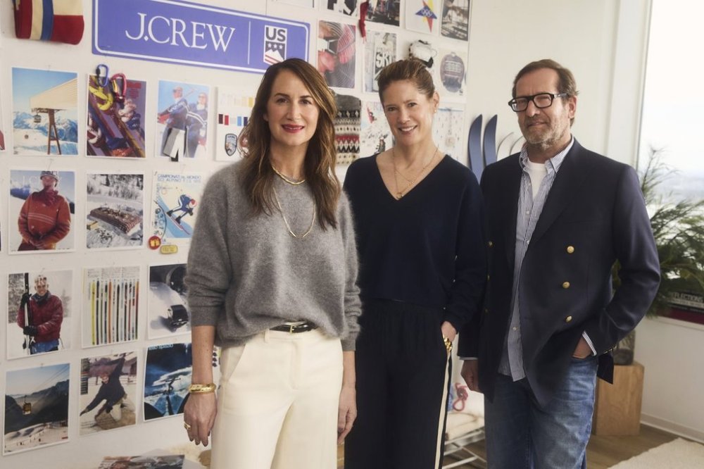 This photo provided by U.S. Ski & Snowboard shows Libby Wadle, the CEO of J.Crew Group; Sophie Goldschmidt, president and CEO of U.S. Ski & Snowboard, and J.Crew chairman Kevin Ullrich at the J.Crew offices in New York. (U.S. Ski & Snowboard via AP)