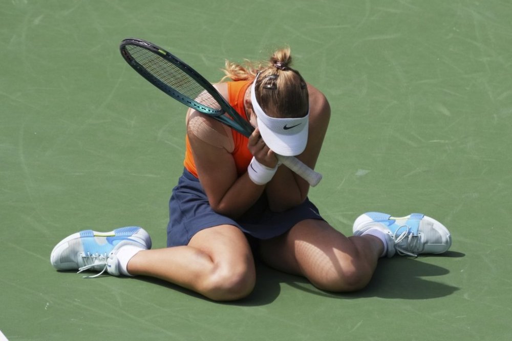 Mirra Andreeva, of Russia, reacts after defeating Aryna Sabalenka, of Belarus, during the final match at the BNP Paribas Open tennis tournament Sunday, March 16, 2025, in Indian Wells, Calif. (AP Photo/Mark J. Terrill)