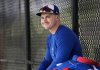 Toronto Blue Jays outfielder Alan Roden sits in the dugout during spring training in Dunedin, Fla., on Thursday, February 20, 2025. THE CANADIAN PRESS/Nathan Denette