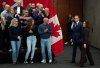 Conservative Leader Pierre Poilievre and his wife Anaida Poilievre leave a news conference in New Westminster B.C., on Sunday, April 6, 2025. THE CANADIAN PRESS/Ethan Cairns