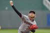 Cleveland Guardians starting pitcher Tanner Bibee throws during the first inning of a baseball game against the Kansas City Royals, Sunday, March 30, 2025, in Kansas City, Mo. (AP Photo/Charlie Riedel)