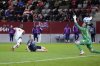 Lyon's Tabitha Chawinga, left, scores the opening goal past Bayern goalkeeper Maria-Luisa Grohs during the Women's Champions League quarterfinal first leg soccer match between FC Bayern Munich and Olympique Lyonnais at the FC Bayern Campus in Munich, Germany, Tuesday, March 18, 2025. (AP Photo/Matthias Schrader)