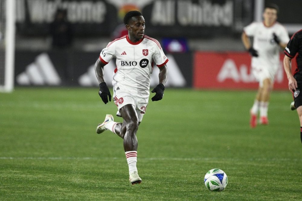Toronto FC midfielder Richie Laryea (22) in action during the first half of an MLS soccer match against D.C. United, in Washington, Saturday, Feb. 22, 2025. THE CANADIAN PRESS/AP-Nick Wass