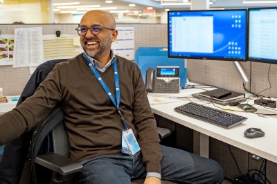 A Winnipeg Airports Authority safety team member at their desk.