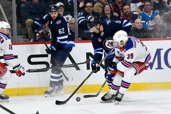 Luke Schenn's toughness (5) and grit had a trickle-down effect on his Winnipeg Jets teammates Tuesday night against the New York Rangers. (Fred Greenslade / The Canadian Press files)