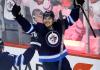 John Woods/Winnipeg Free Press
Winnipeg Jets' Adam Lowry (17)¤ and Brandon Tanev (13) celebrate Tanev's goal against the Nashville Predators during third period NHL round two game three playoff action in Winnipeg, Tuesday, May 1, 2018.
