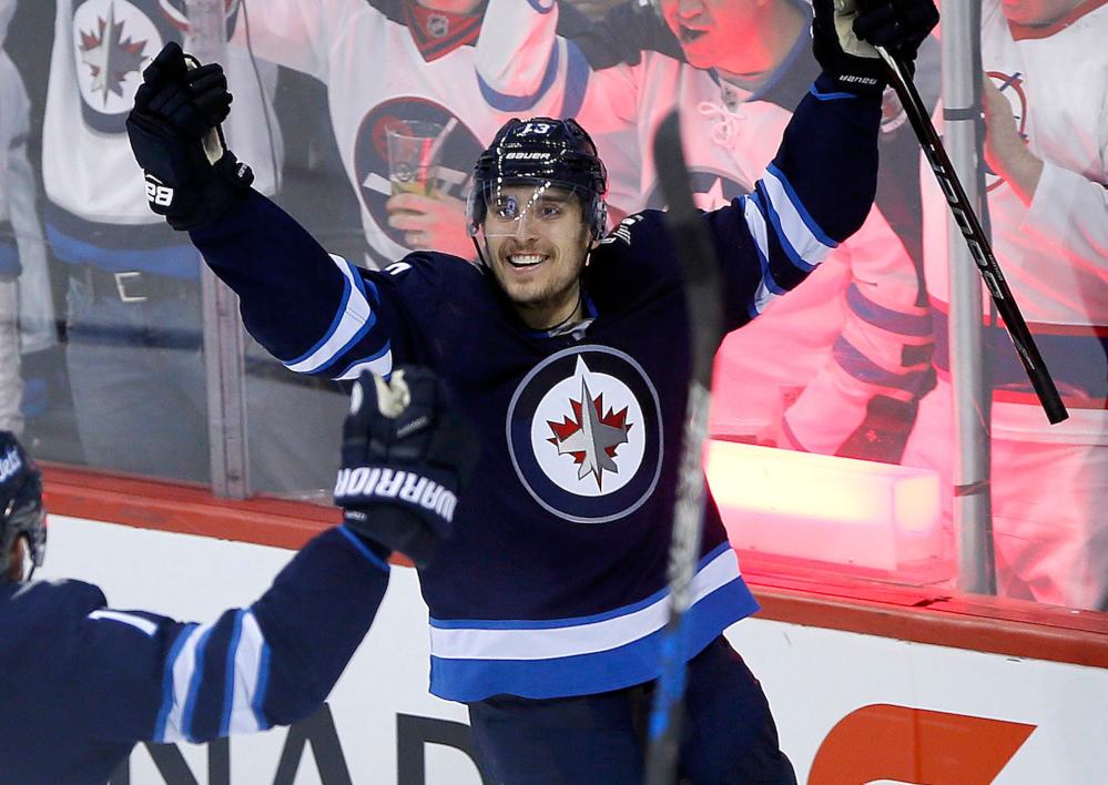 John Woods/Free Press Files
Brandon Tanev celebrates a goal as a Winnipeg Jet against the Nashville Predators in 2018. The feisty forward will once again be a Jet after being acquired by the team at the trade deadline.