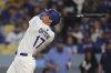 Los Angeles Dodgers' Shohei Ohtani flies out during the third inning of a baseball game against the Detroit Tigers, Saturday, March 29, 2025, in Los Angeles. (AP Photo/Mark J. Terrill)