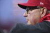 Cincinnati Reds manager Terry Francona watches play in the fourth inning of a baseball game against the Texas Rangers, Monday, March 31, 2025, in Cincinnati. (AP Photo/Kareem Elgazzar)