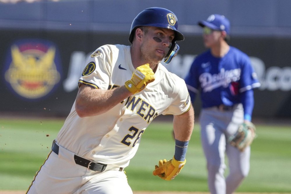 FILE - Milwaukee Brewers' Brewer Hicklen rounds third base during the second inning of a spring training baseball game against the Los Angeles Dodgers, in Phoenix, Feb. 26, 2025. (AP Photo/Darryl Webb, File)
