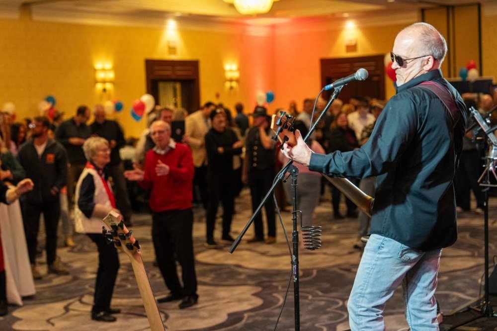 Wisconsin Supreme Court candidate Brad Schimel plays with his band