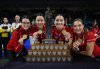 Team Canada skip Kerri Einarson, from left to right, third Val Sweeting, second Shannon Birchard and lead Briane Harris pose with their gold medals and the trophy after defeating Manitoba in the final at the Scotties Tournament of Hearts in Kamloops, B.C., on Sunday, Feb. 26, 2023. THE CANADIAN PRESS/Darryl Dyck