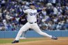 Los Angeles Dodgers' Blake Snell throws against the Atlanta Braves during the first inning of a baseball game Wednesday, April 2, 2025, in Los Angeles. (AP Photo/Kevork Djansezian)