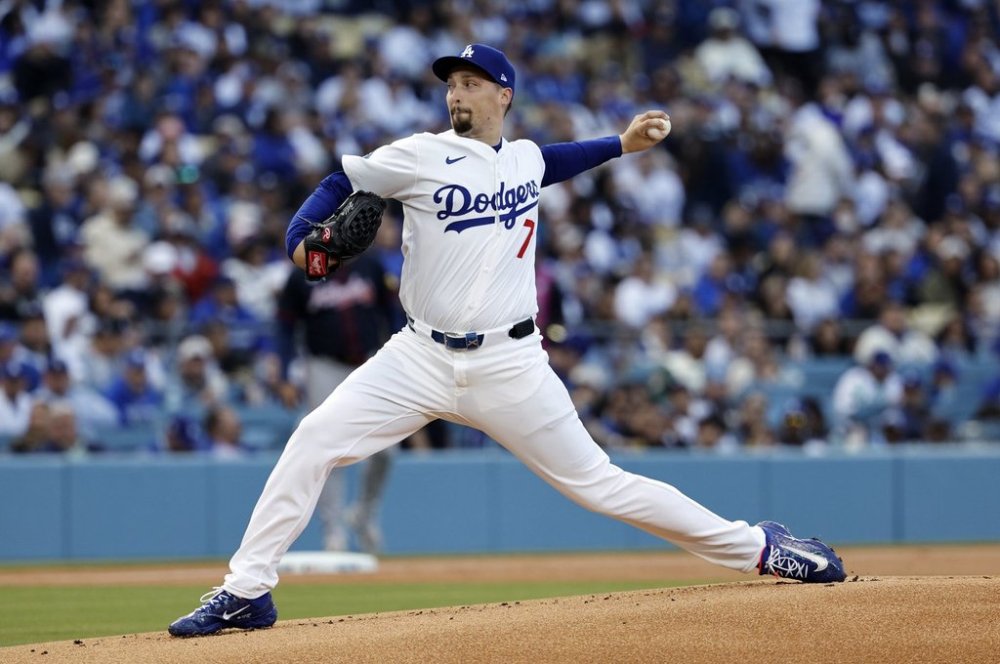 Los Angeles Dodgers' Blake Snell throws against the Atlanta Braves during the first inning of a baseball game Wednesday, April 2, 2025, in Los Angeles. (AP Photo/Kevork Djansezian)