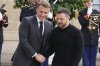 FILE - French President Emmanuel Macron, left, welcomes his Ukrainian counterpart Volodymyr Zelenskyy before a meeting at the Elysee Palace, in Paris, Thursday, Oct. 10, 2024. (AP Photo/Michel Euler, File)