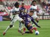 Vancouver Whitecaps' J.C. Ngando (left) battles with Pumas UNAM's Piero Quispe during the first half of a CONCACAF Champions Cup quarterfinal soccer match, in Vancouver, on Wednesday, April 2, 2025. THE CANADIAN PRESS/Christopher Morris