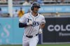 Tampa Bay Rays' Brandon Lowe runs around the bases following his two-run home run off Colorado Rockies pitcher Ryan Feltner during the first inning of a baseball game Sunday, March 30, 2025, in Tampa, Fla. (AP Photo/Chris O'Meara)