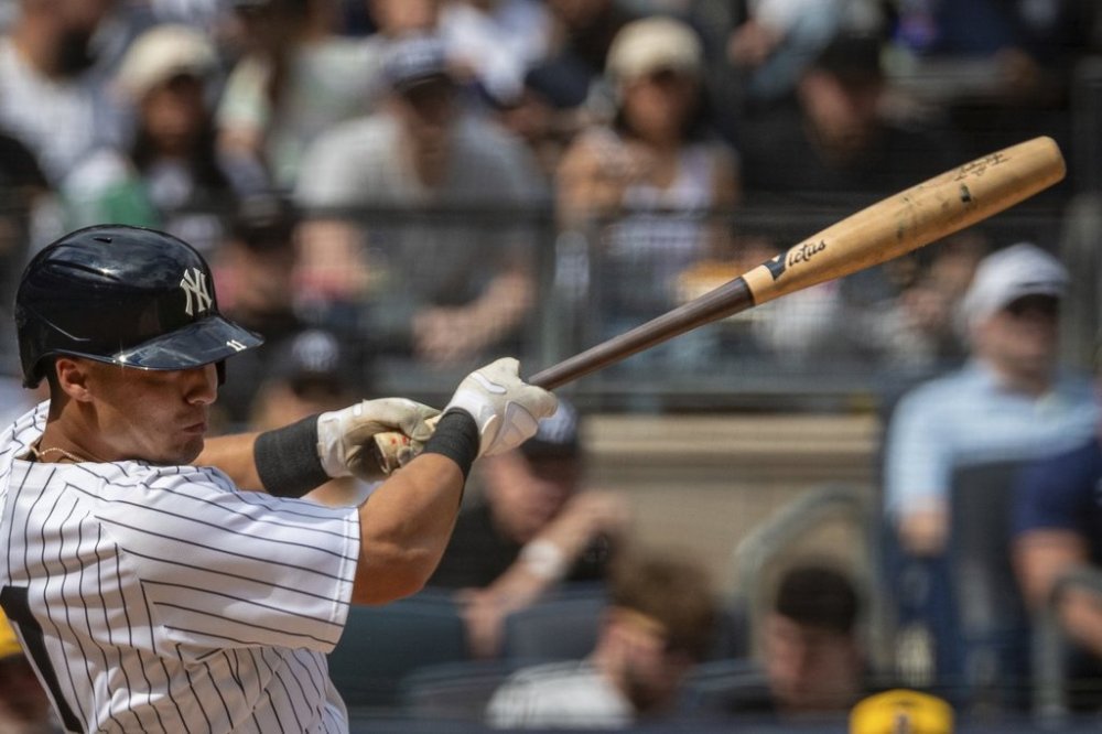 New York Yankees' Anthony Volpe bats with one of the team's newly-made torpedo-shaped bats in a baseball game against the Milwaukee Brewers, Saturday, March 29, 2025, in New York. (AP Photo/Angelina Katsanis)