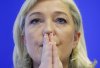 FILE - French far right presidential candidate Marine Le Pen attends a party meeting in Nanterre, France, Thursday, Jan. 12, 2012. (AP Photo/Jacques Brinon. File)
