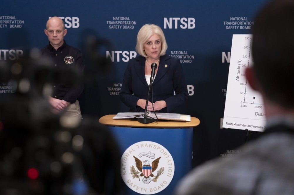 National Transportation Safety Board (NTSB) Chairwoman Jennifer Homendy, accompanied by investigator in charge Brice Banning, left, speaks about the recent mid-air collision of an American Airlines flight and a Black Hawk helicopter near Ronald Reagan Washington National Airport, at a news conference in Washington, Tuesday, March 11, 2025. (AP Photo/Ben Curtis)