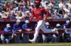Los Angeles Angels' Randy De Jesus scores on a sacrifice fly by Mickey Moniak during the fourth inning of a spring training baseball game against the Texas Rangers, Friday, March 21, 2025, in Tempe, Ariz. (AP Photo/Matt York)