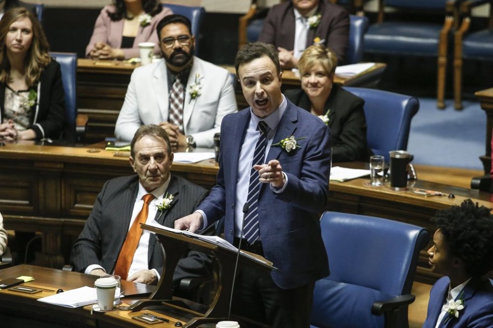 Manitoba Finance Minister Adrien Sala delivers the provincial budget in the legislature in Winnipeg, April 2, 2024. THE CANADIAN PRESS/John Woods