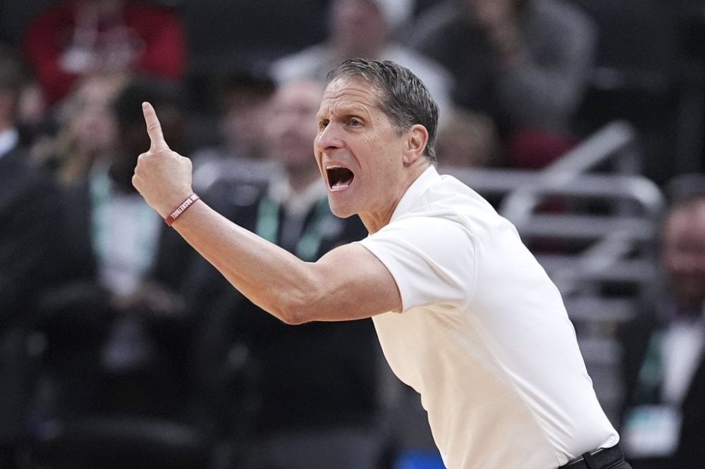 Southern California head coach Eric Musselamn gives signals against Rutgers during the second half of an NCAA college basketball game in the first round of the Big Ten Conference tournament in Indianapolis, Wednesday, March 12, 2025. (AP Photo/Michael Conroy)