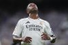 Real Madrid's Kylian Mbappe reacts after missing a chance to score a goal against Valencia during a Spanish La Liga soccer match between Real Madrid and Valencia at the Santiago Bernabeu stadium in Madrid, Spain, Saturday, April 5, 2025. (AP Photo/Manu Fernandez)