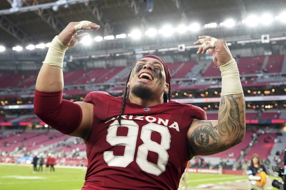 FILE - Arizona Cardinals defensive tackle Roy Lopez celebrates after an NFL football game against the New York Jets, Nov. 10, 2024, in Glendale, Ariz. (AP Photo/Brynn Anderson, file)