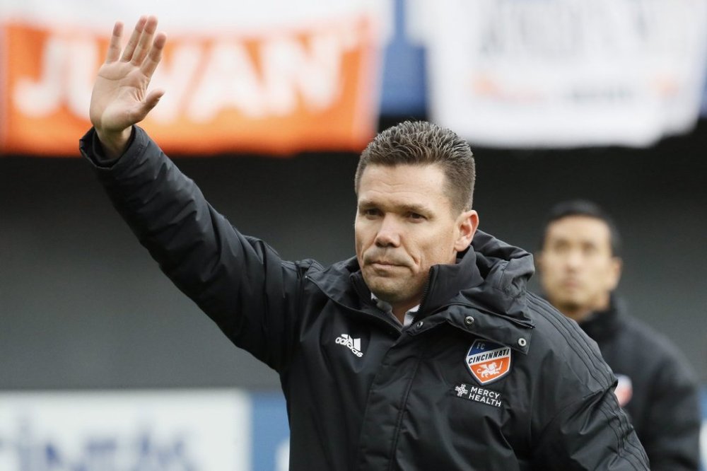 FC Cincinnati head coach Alan Koch waves to the crowd before an MLS soccer match against the Portland Timbers, Sunday, March 17, 2019, in Cincinnati. Koch's lengthy resume includes stops in Major League Soccer and the Canadian Premier League as well as coaching a young Alphonso Davies. THE CANADIAN PRESS/AP/John Minchillo