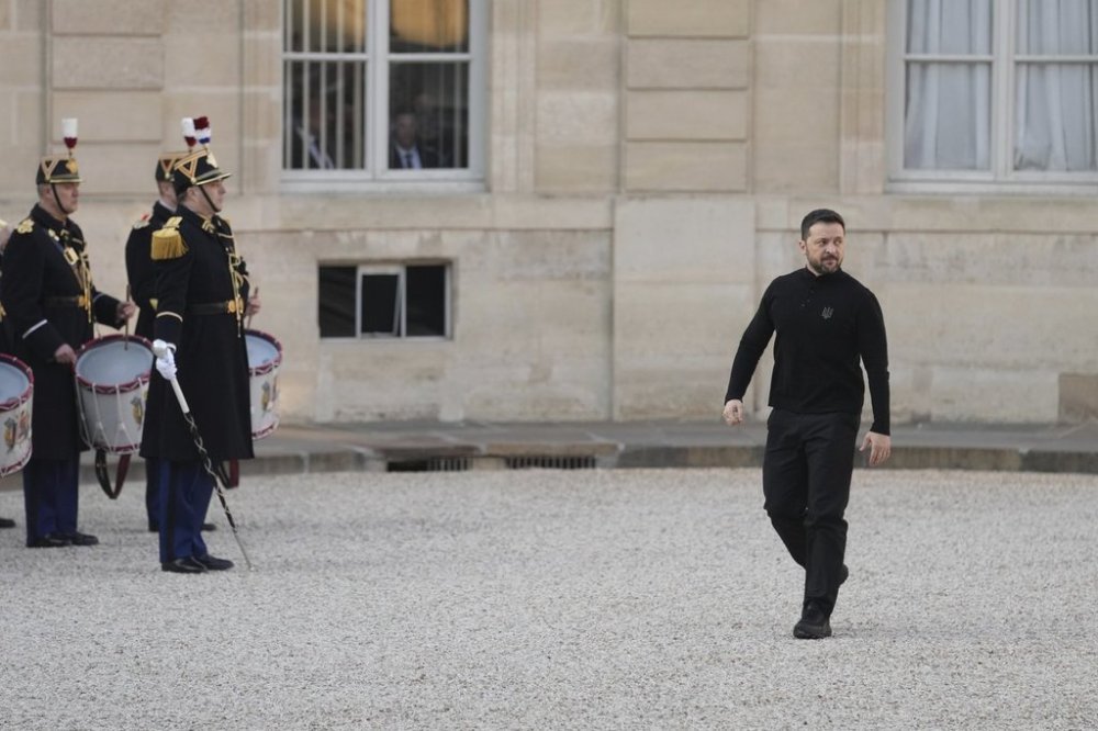 Ukrainian President Volodymyr Zelenskyy arrives before his meeting with French President Emmanuel Macron to prepare Thursday's gathering of the so-called