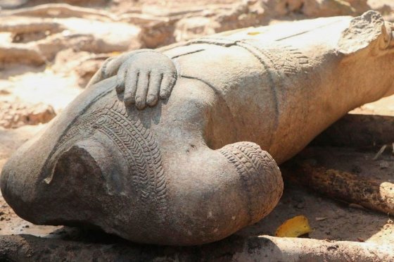 A headless statue excavated by archaeologists at the Angkor temple complex in Cambodia's Siem Reap province. (Apsara National Authority via The Associated Press)