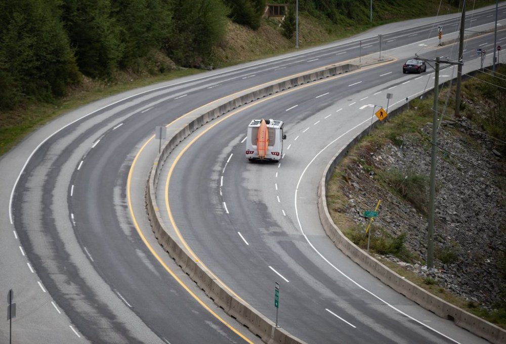 A motorist in a recreational vehicle travels on the Sea-to-Sky Highway between Horseshoe Bay and Lions Bay, B.C., in this file photo from Friday, April 23, 2021. A multi-vehicle crash has shut down the Sea-to-Sky Highway in both directions on the way to Whistler, B.C. THE CANADIAN PRESS/Darryl Dyck
