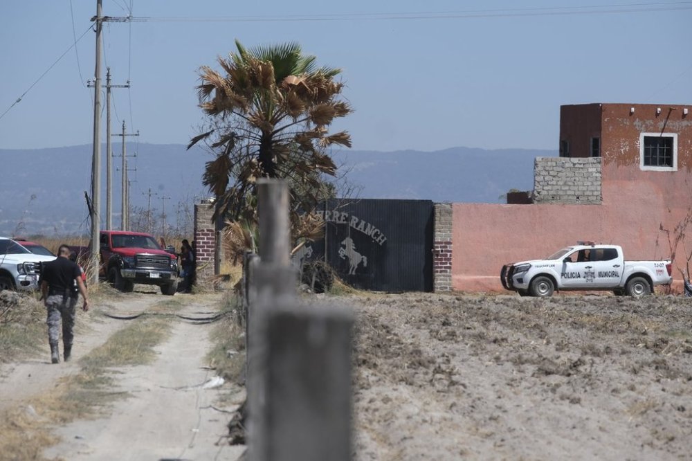 Police guard access to Izaguirre Ranch in Teuchitlan, Jalisco state, Mexico, Tuesday, March 11, 2025. (AP Photo/Alfredo Moya)
