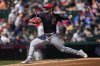 Cleveland Guardians pitcher Logan Allen throws aginst the Los Angeles Angels during the first inning of a spring training baseball game, Wednesday, March 19, 2025, in Tempe, Ariz. (AP Photo/Matt York)