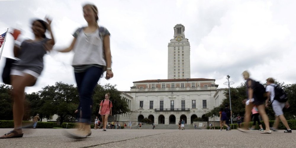 FILE - Students walk on the University of Texas campus in Austin, Texas., Sept. 27, 2012. (AP Photo/Eric Gay, File)