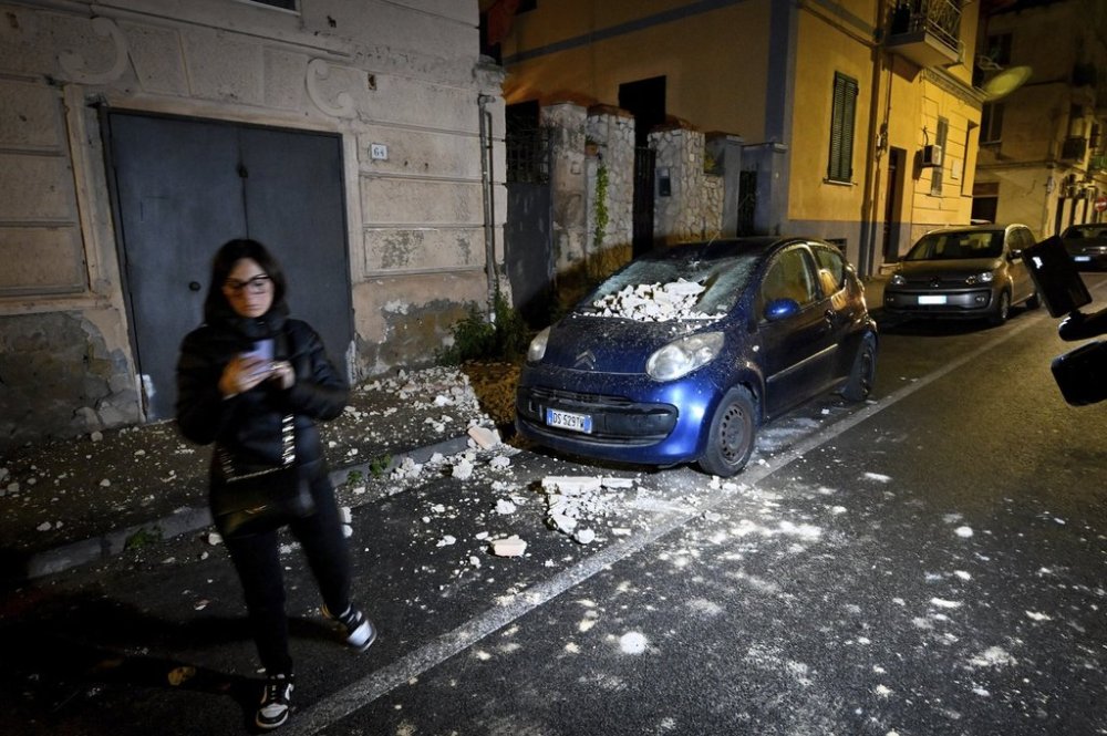 Debris on a car following an earthquake north of Naples, Italy, Thursday March 13, 2025. (Alessandro Garofalo/LaPresse via AP)
