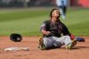 Cleveland Guardians' Jose Ramirez reacts after getting caught stealing second during the third inning of a baseball game against the Kansas City Royals, Saturday, March 29, 2025, in Kansas City, Mo. (AP Photo/Charlie Riedel)