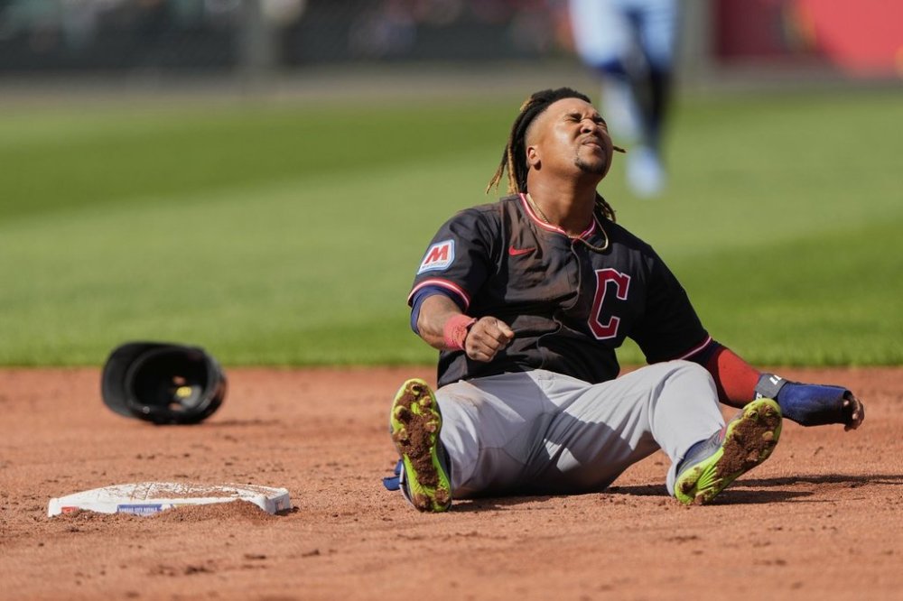 Cleveland Guardians' Jose Ramirez reacts after getting caught stealing second during the third inning of a baseball game against the Kansas City Royals, Saturday, March 29, 2025, in Kansas City, Mo. (AP Photo/Charlie Riedel)