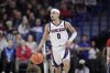 Gonzaga guard Ryan Nembhard (0) controls the ball during the second half of an NCAA college basketball game against Santa Clara, Saturday, Jan. 18, 2025, in Spokane, Wash. (AP Photo/Young Kwak)