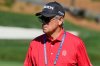 Randy Smith watches Scottie Scheffler during a practice round at The Players Championship golf tournament Wednesday, March 12, 2025, in Ponte Vedra Beach, Fla. (AP Photo/Chris O'Meara)
