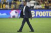 Indonesia's coach Patrick Kluivert walks onto the field after losing their soccer World Cup qualifying match against Australia at the Sydney Football Stadium, Sydney, Australia, Thursday, March 20, 2025. (AP Photo/Mark Baker)