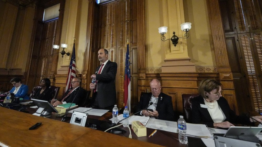 FILE - Georgia's State Election Board members discuss proposals for election rule changes at the state capitol, Friday, Sept. 20, 2024, in Atlanta. (AP Photo/Mike Stewart, File)