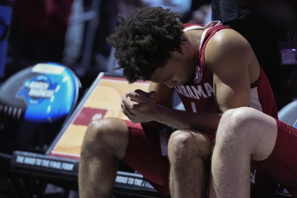 Alabama guard Mark Sears (1) sits on the bench during player introductions before playing against the Duke in an Elite Eight round NCAA college basketball tournament game, Saturday, March 29, 2025, in Newark, N.J. (AP Photo/Julia Demaree Nikhinson)