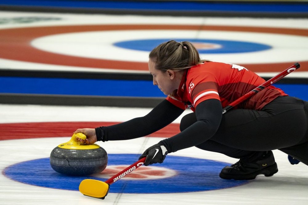 Team Canada skip Rachel Homan delivers a rock against Manitoba in her teams quarter final victory during the Scotties Tournament of Hearts action in Thunder Bay, Ont., Saturday, Feb. 22, 2025. THE CANADIAN PRESS/David Jackson