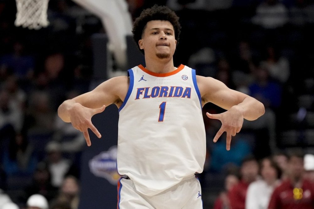 Florida guard Walter Clayton Jr. (1) reacts to a basket against Alabama during the second half of an NCAA college basketball game in the semifinal round of the Southeastern Conference tournament, Saturday, March 15, 2025, in Nashville, Tenn. (AP Photo/George Walker IV)