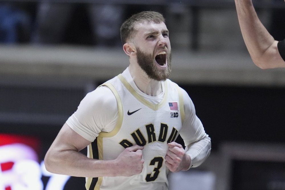 Purdue guard Braden Smith (3) celebrates after a basket against Rutgers during the second half of an NCAA college basketball game in West Lafayette, Ind., Tuesday, March 4, 2025. (AP Photo/Michael Conroy)