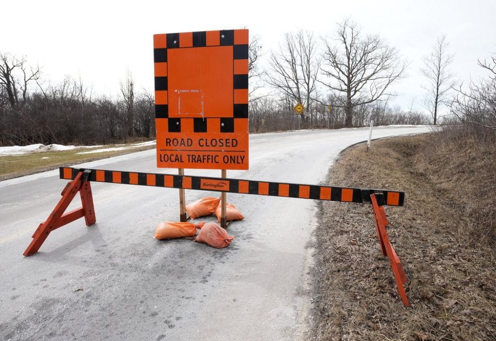 A section of King Road is closed every spring since 2012 to help the Jefferson salamander who live along the Niagara Escarpment as they make the nocturnal trip to their vernal pools in Burlington, Ont., on Wednesday, March 12, 2025. THE CANADIAN PRESS/Nathan Denette