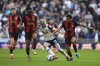 Tottenham Hotspur's Lucas Bergvall is challenged for the ball by Bournemouth's Antoine Semenyo, left, and Tyler Adams during the English Premier League soccer match between Tottenham Hotspur and Bournemouth, at the Tottenham Hotspur Stadium, in London, Sunday March 9, 2025. (Bradley Collyer/PA via AP)