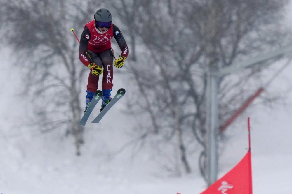 Canada's Courtney Hoffos competes during the women's cross finals at the 2022 Winter Olympics, Thursday, Feb. 17, 2022, in Zhangjiakou, China. THE CANADIAN PRESS/AP- Alessandra Tarantino